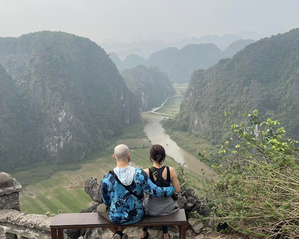 The couple sightseeing at Mua Cave, Ninh Binh