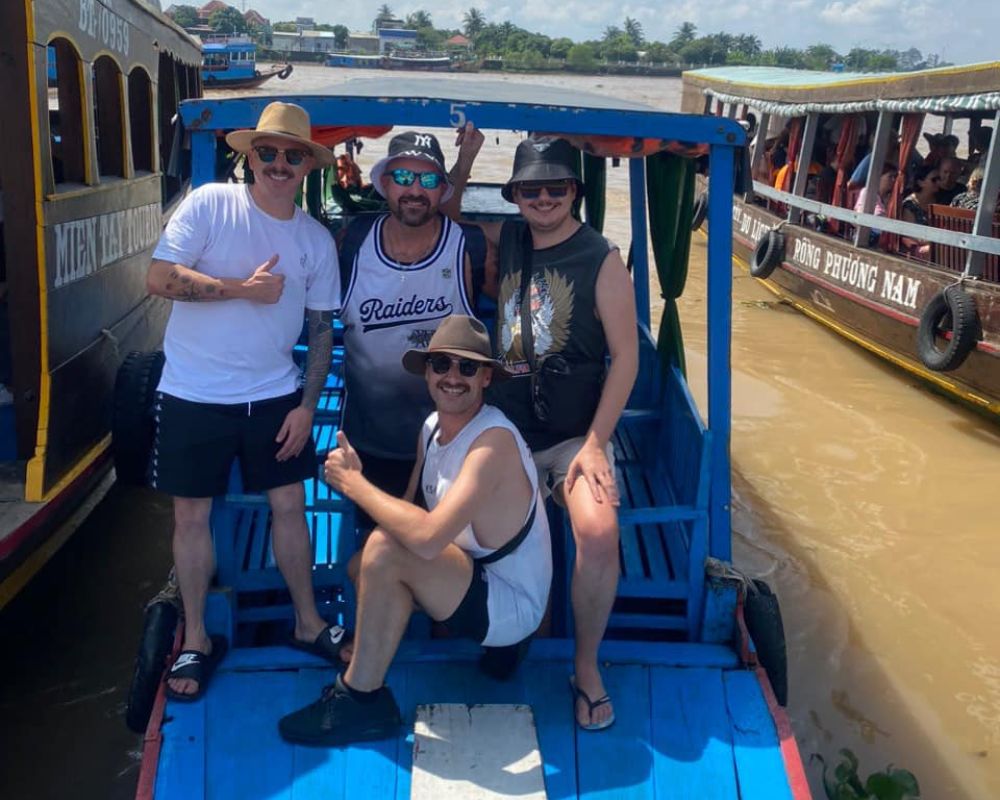 Visit the island of Tien river by boat