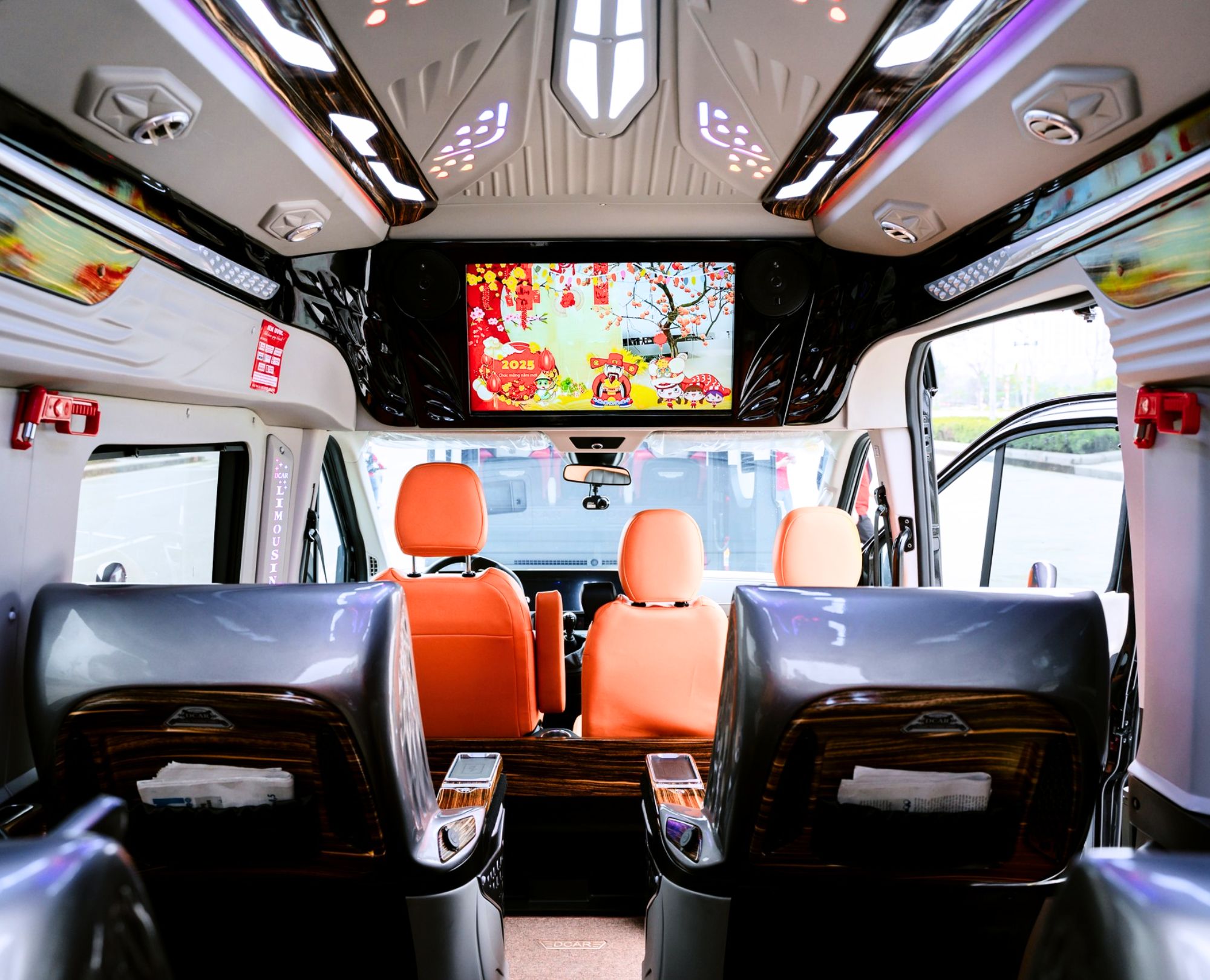 High-tech-interior-of-DCar-First-Class-limousine-with-large-LED-TV-and-decorative-ceiling-lights