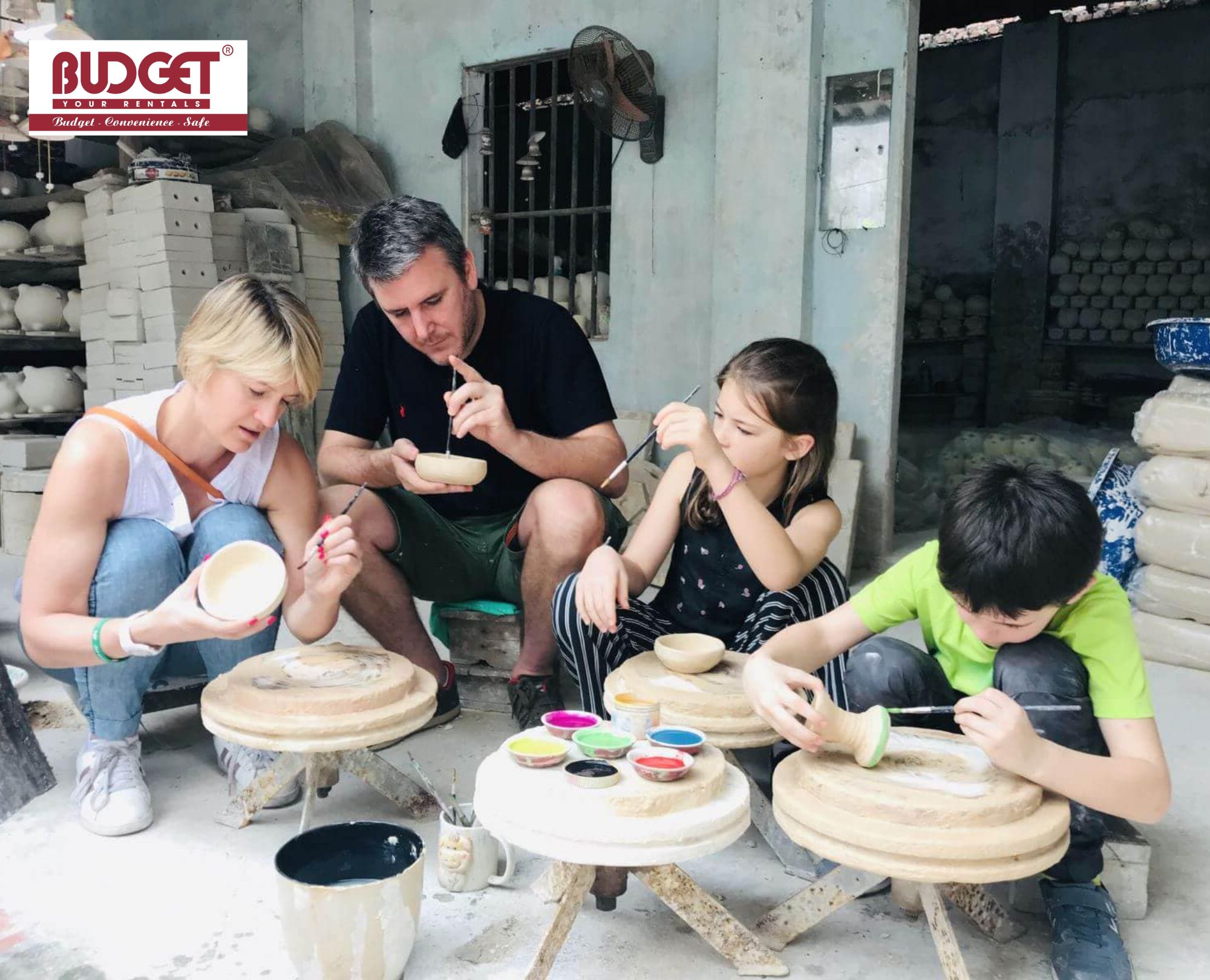 International-family-enjoying-a-pottery-making-workshop-at-Bat-Trang-Ceramics-Village