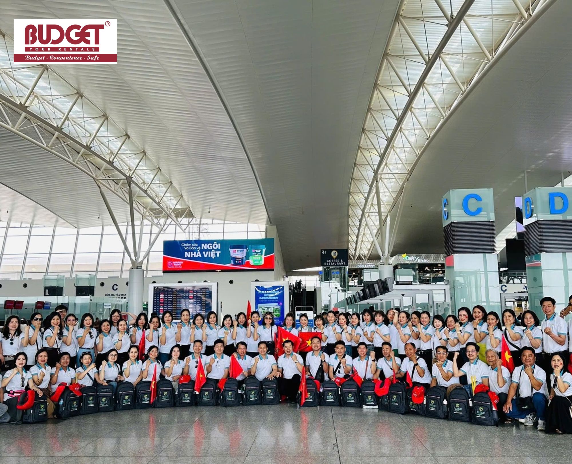 Large-group-of-travelers-at-Noi-Bai-International-Airport-terminal-Hanoi-Vietnam