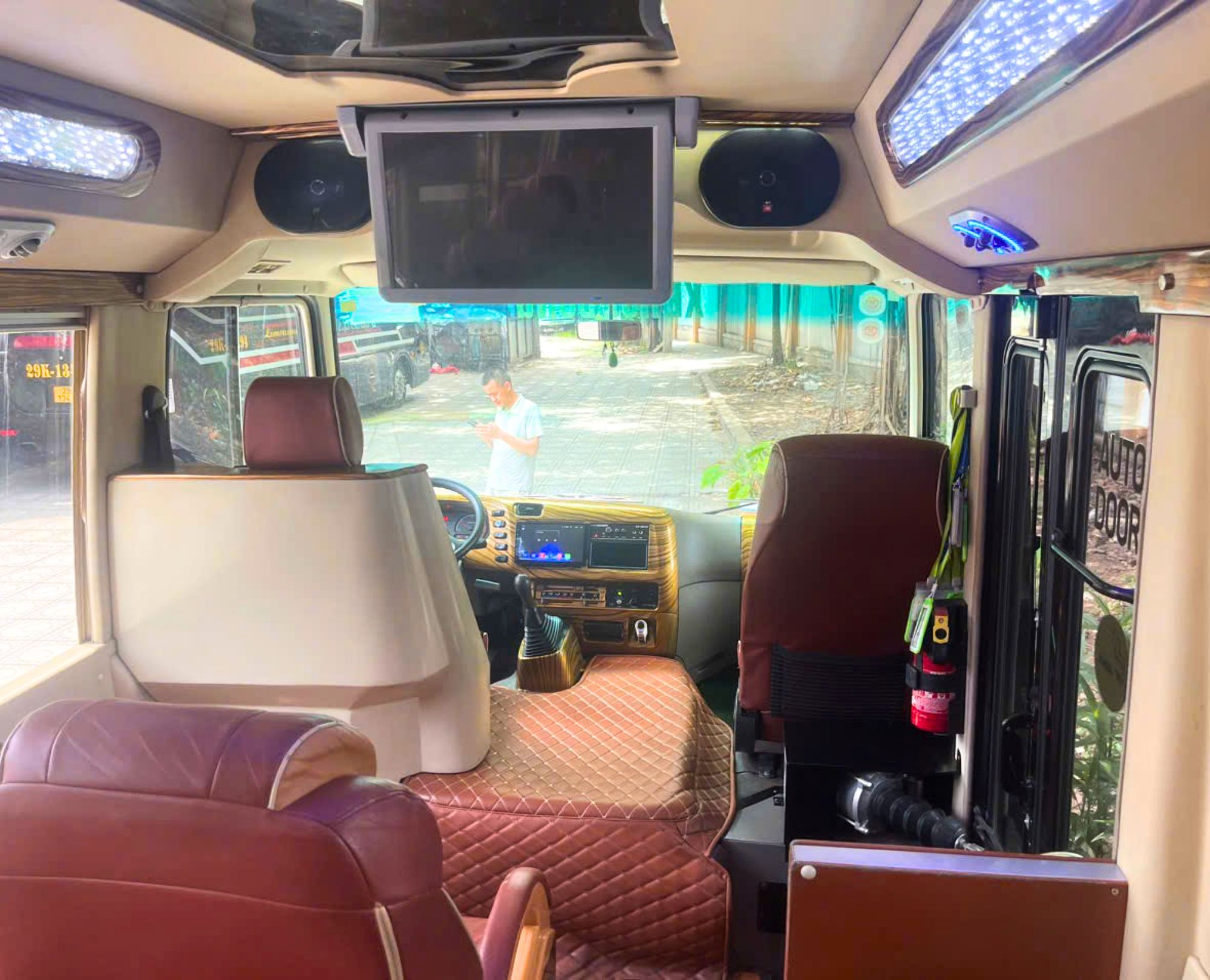Modern-entertainment-system-in-Fuso-Limousine-19-seater-with-large-LCD-screen-and-premium-sound