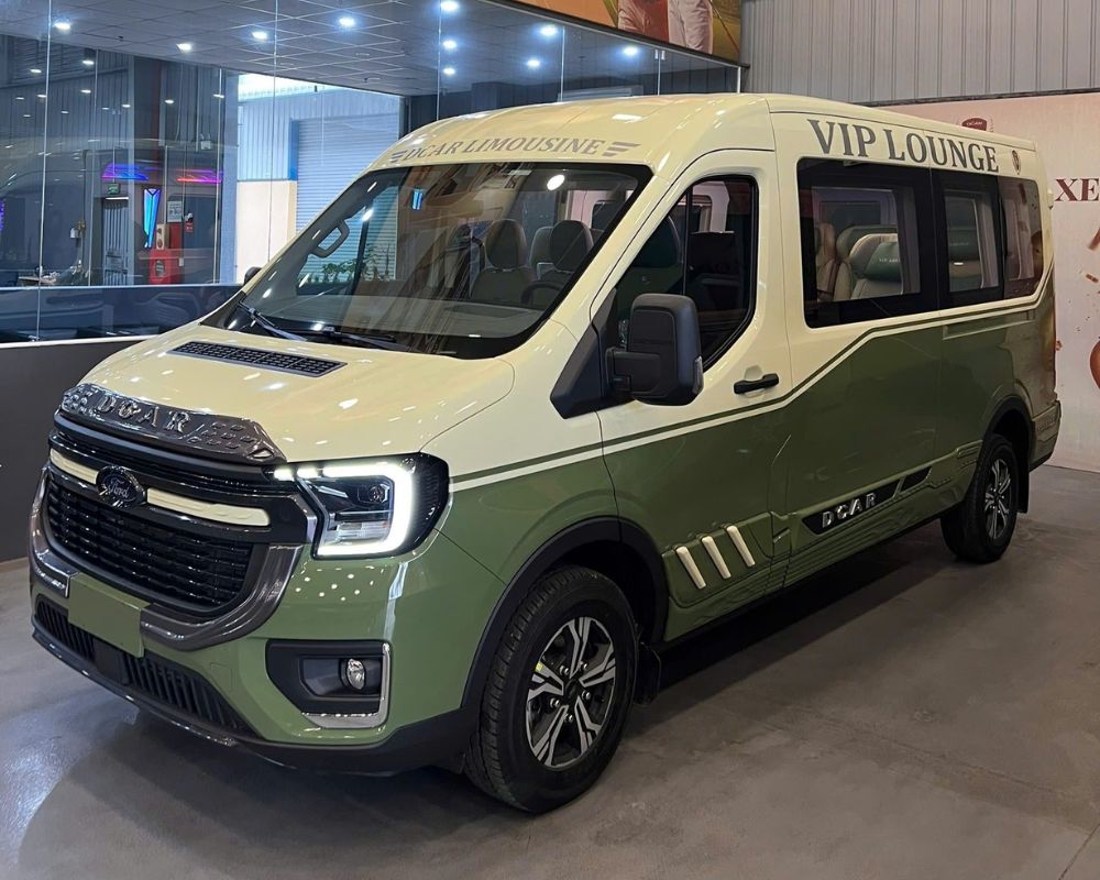 Green and cream Ford DCAR VIP Lounge van