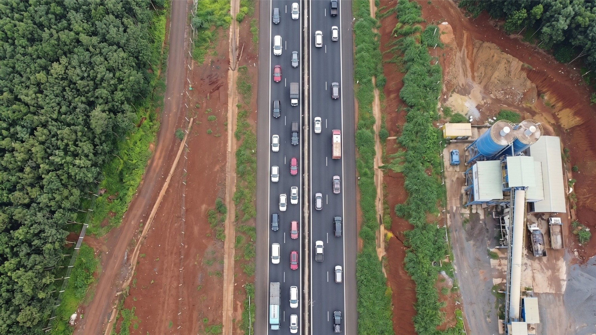 Top-down-view-of-cars-and-trucks-on-the-multi-lane-Dau-Giay-Phan-Thiet-highway-infrastructure