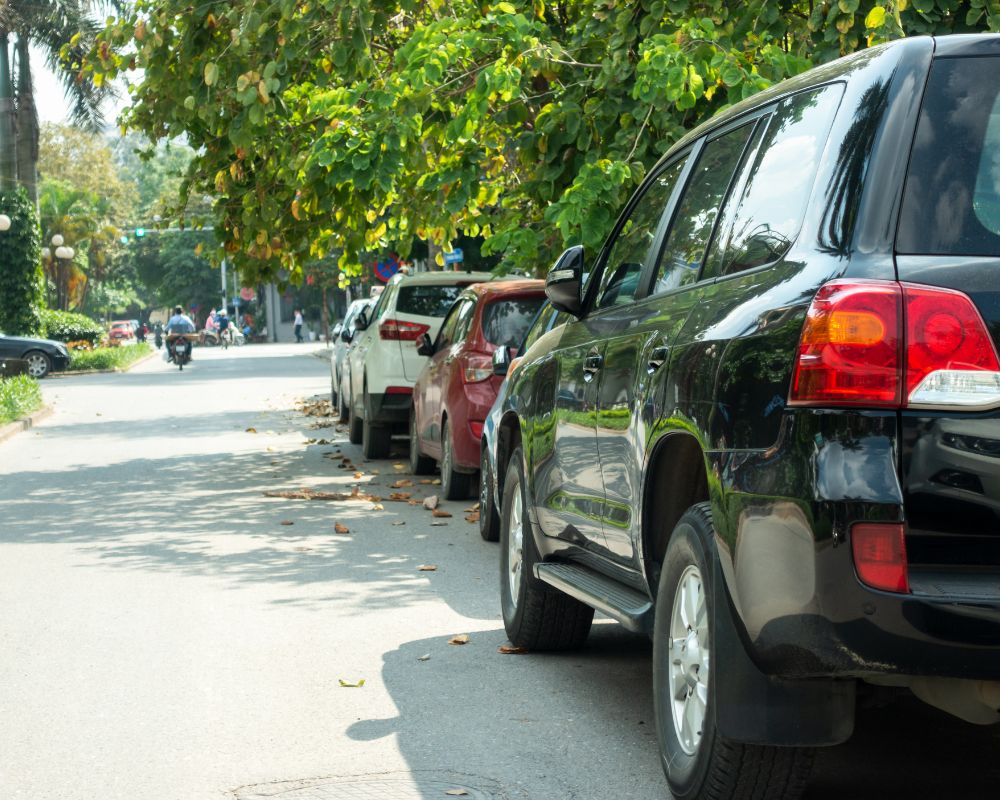 Cars Parking on Hanoi Street typically involves a fee