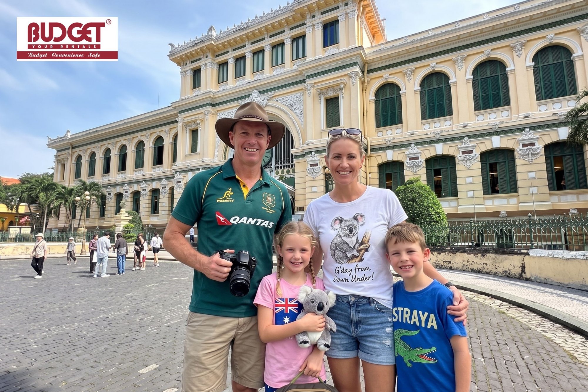 Australian-family-tourists-posing-in-front-of-the-historic-Saigon-Central-Post-Office-in-Ho-Chi-Minh-City