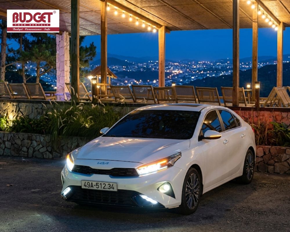 KIA-K3-parking-in-front-of-a-coffee-with-a-stunning-night-view-of-Da-Lat
