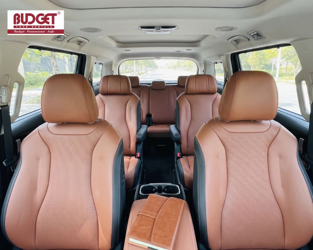 Luxurious-tan-leather-interior-of-a-spacious-7-seat-used-for-premium-private-transfers-in-Vietnam