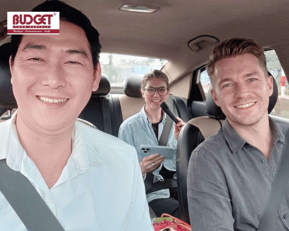 Our-driver-taking-a-selfie-with-happy-foreign-tourists-inside-a-car