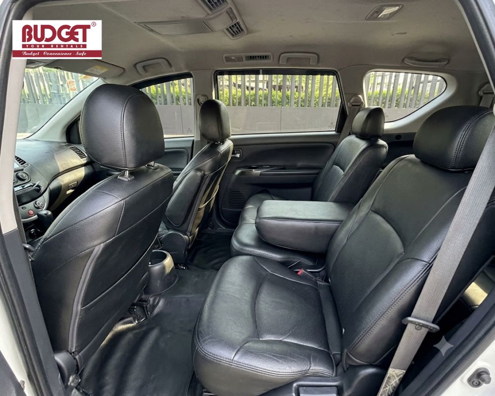 Spacious-and-comfortable-black-leather-interior-of-a-7-seat-MPV