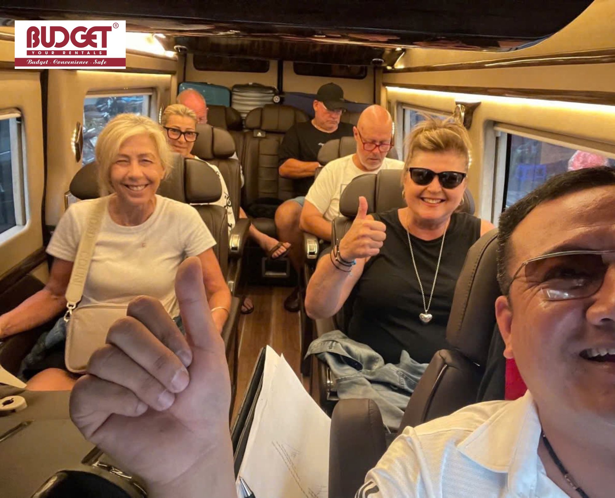 Tourists-are-delighted-to-enjoy-the-modern-amenities-of-the-limousine-service-from-Vietnam-Budget-Car-Rental