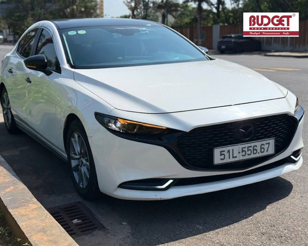 White-4-seater-Mazda-3-sedan-recommended-for-family-and-couples