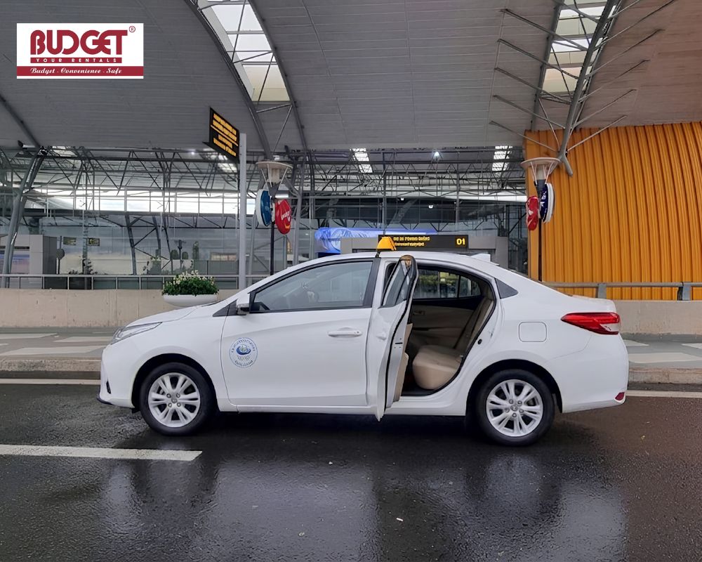 White-Toyota-Vios-4-seat-ready-for-private-airport-transfer-from-Lien-Khuong-Airport-to-Da-Lat-city-center