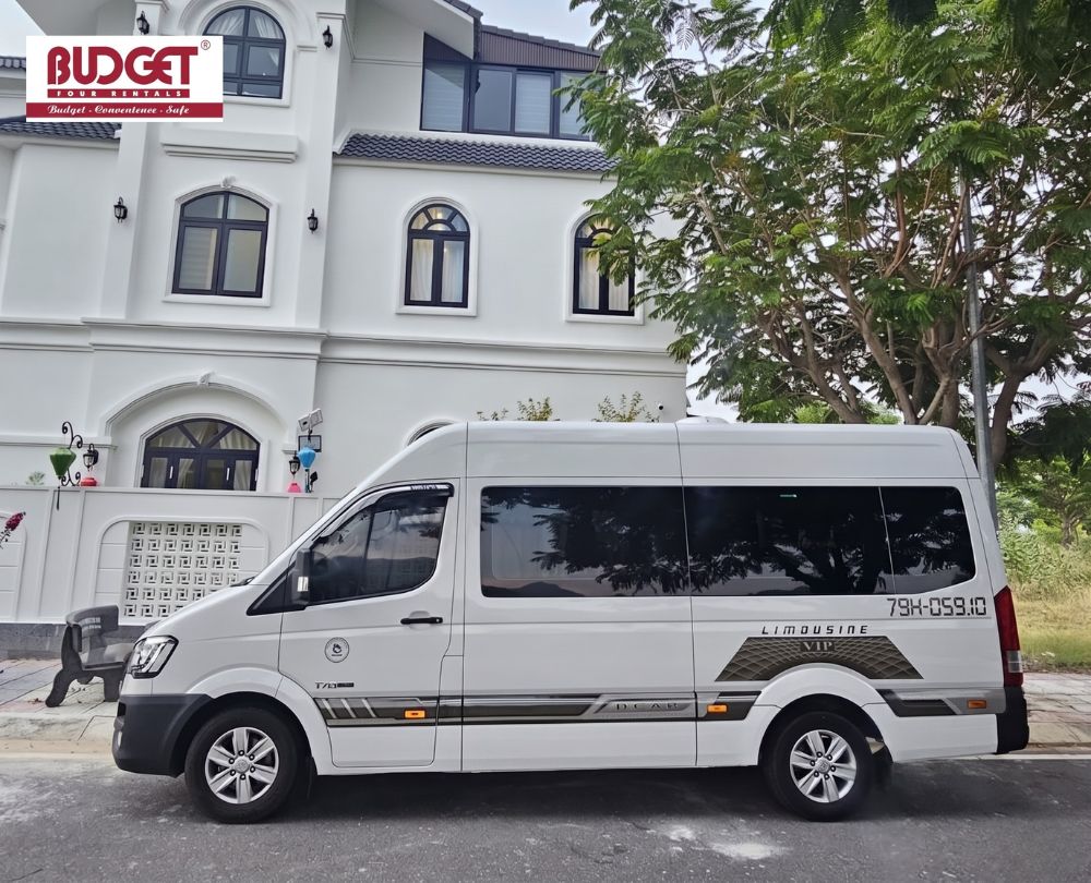 White-VIP-Limousine-van-parked-outside-a-villa-for-premium-private-transfers-in-Nha-Trang