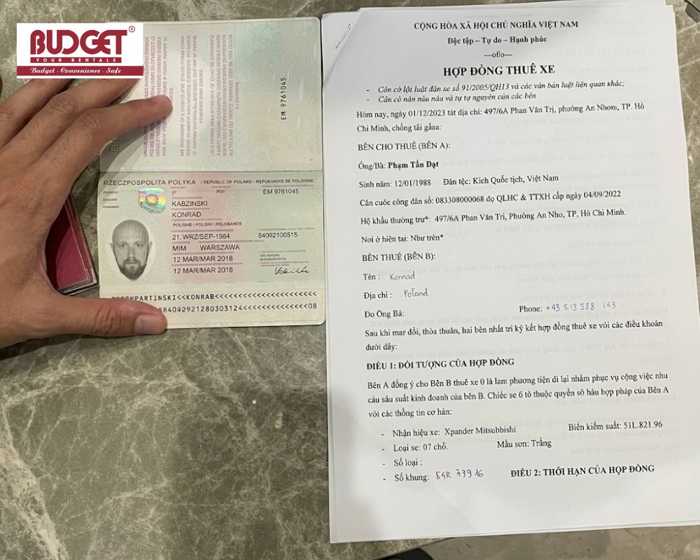 A-Polish-passport-and-a-car-rental-contract-written-in-Vietnamese-displayed-side-by-side-for-verification