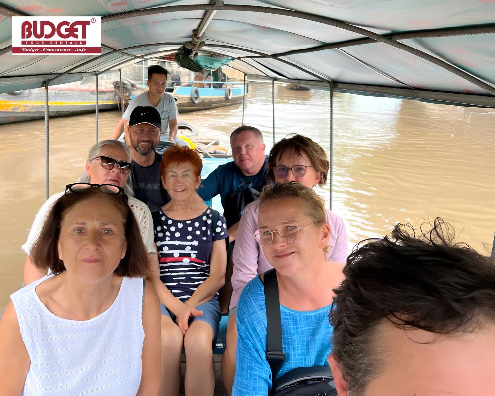 A-group-of-Australian-travelers-enjoying-a-scenic-boat-tour-at-Ben-Tre