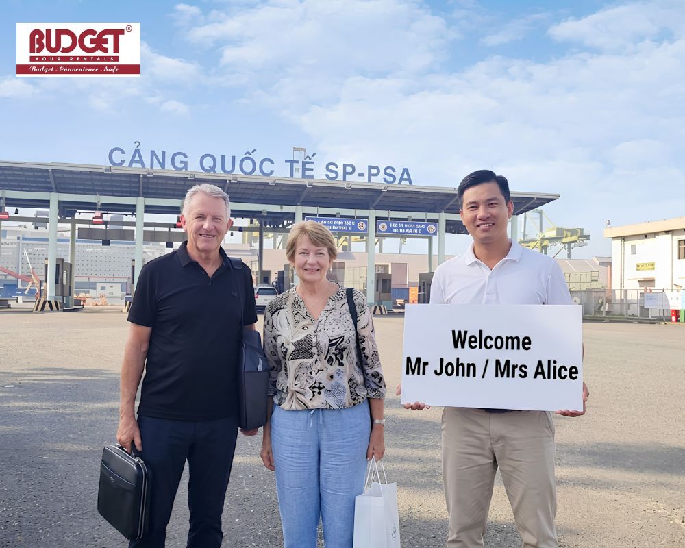 A-professional-driver-from-Vietnam-Budget-Car-Rental-welcoming-Mr.John-and-Mrs.Alice-at-SP-PSA-International-Port
