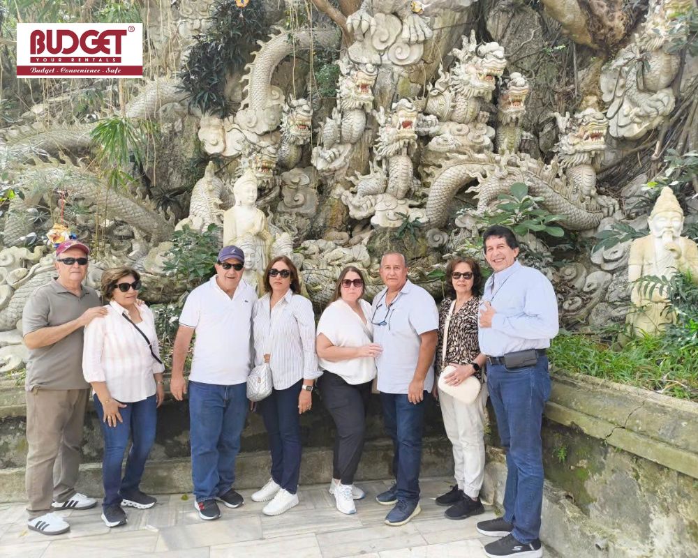 Colombian-tourists-took-a-picture-in-front-of-the-ornate-traditional-temple-gate-at-Marble-Mountains