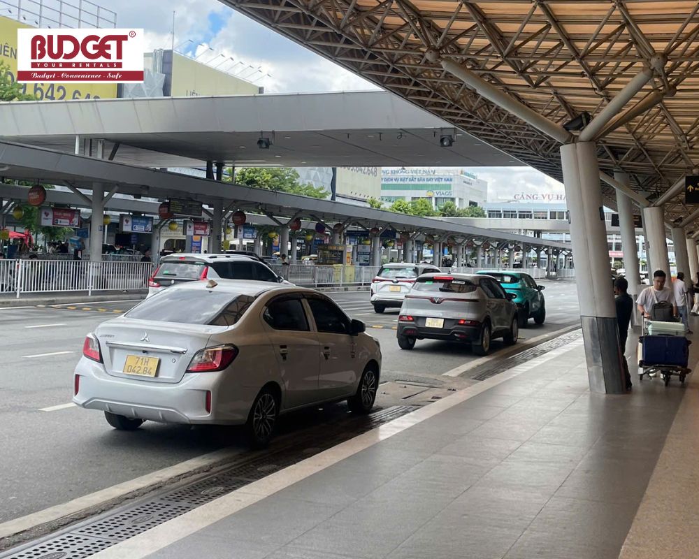 Our-4-seat-car-waiting-in-the-passenger-pick-up-lane-at-Tan-Son-Nhat-International-Airport