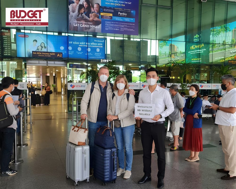 Our-driver-greeting-French-guests-with-a-welcome-sign-at-Tan-Son-Nhat-International-Airport