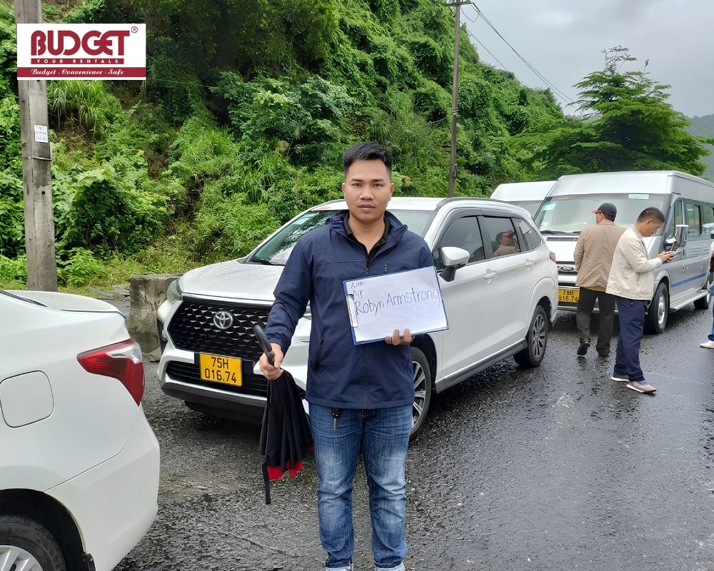Our-driver-held-a-welcome-sign-for-Mr.Robyn-Armstrong-outside-Chan-May-Port