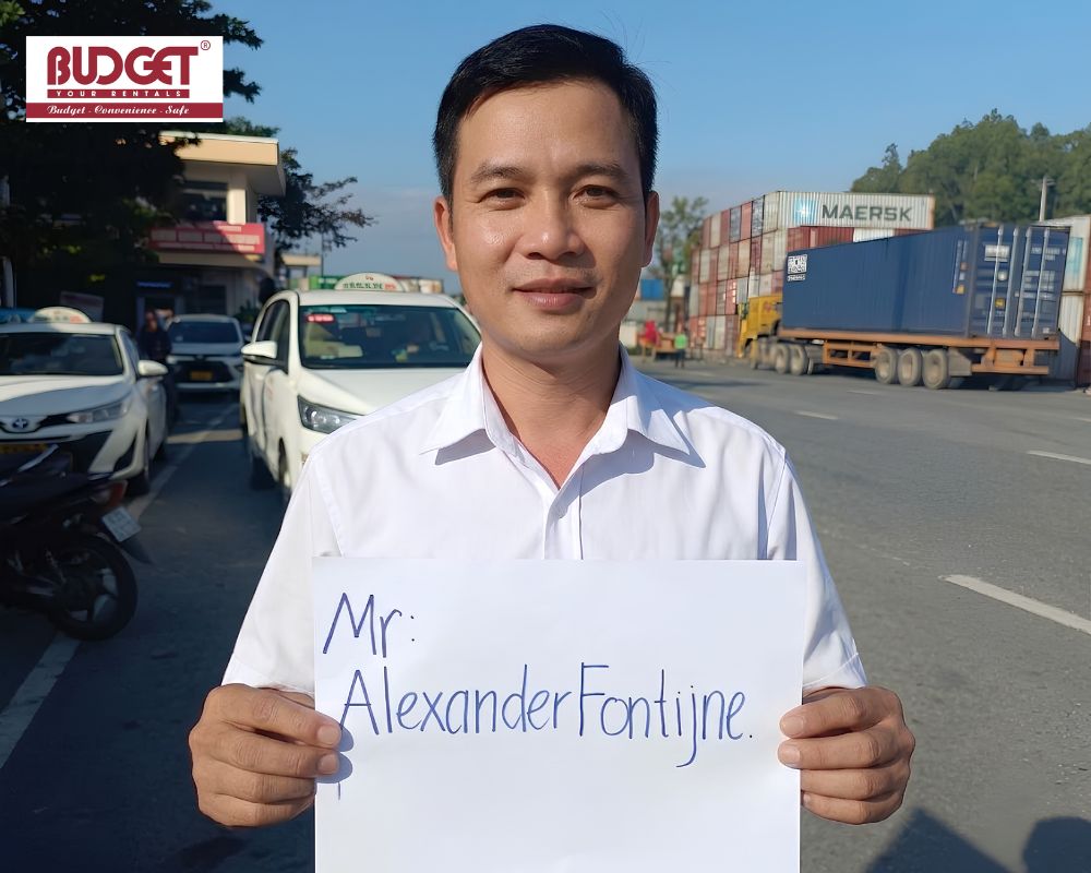 Our-driver-held-a-welcome-sign-with-the-guest-s-name-outside-Chan-May-Port