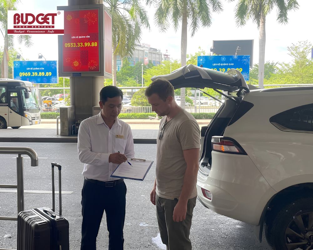Our-driver-presented-a-self-drive-car-rental-contract-to-a-customer-at-Tan-Son-Nhat-Airport