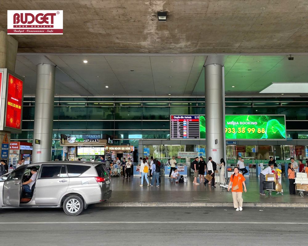 Our-rental-car-was-parked-outside-the-terminal-building-at-Tan-Son-Nhat-International-Airport-during-a-customer-pickup