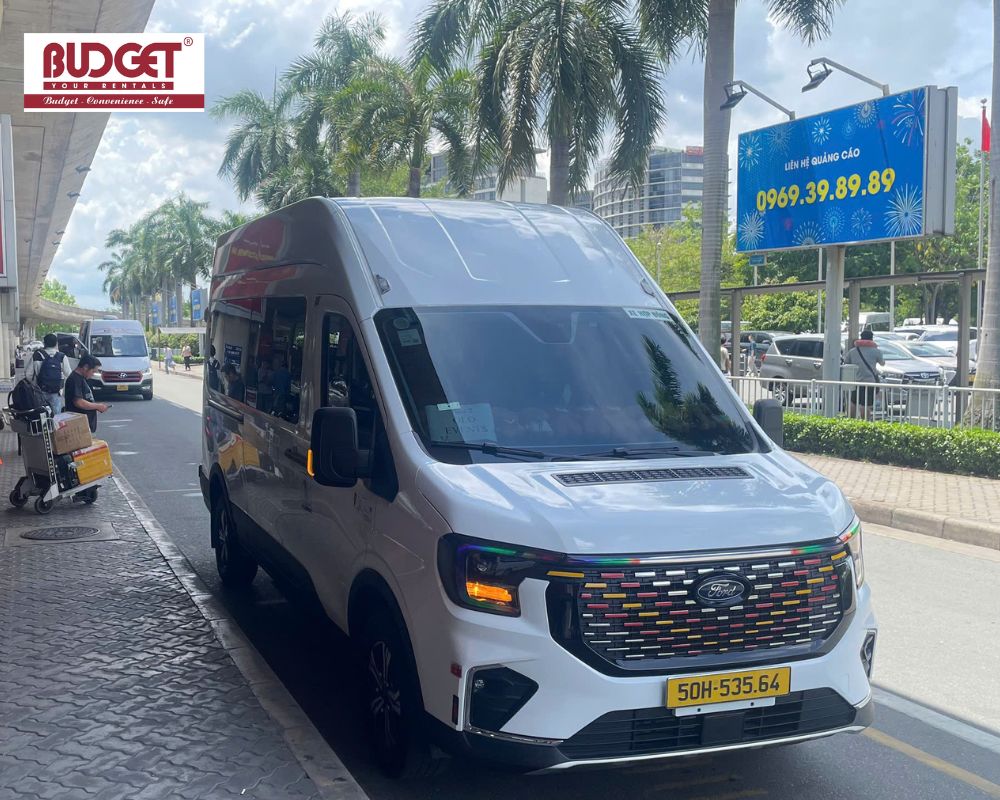 Our-white-Ford-Transit-van-at-Ho-Chi-Minh-airport-pick-up-area