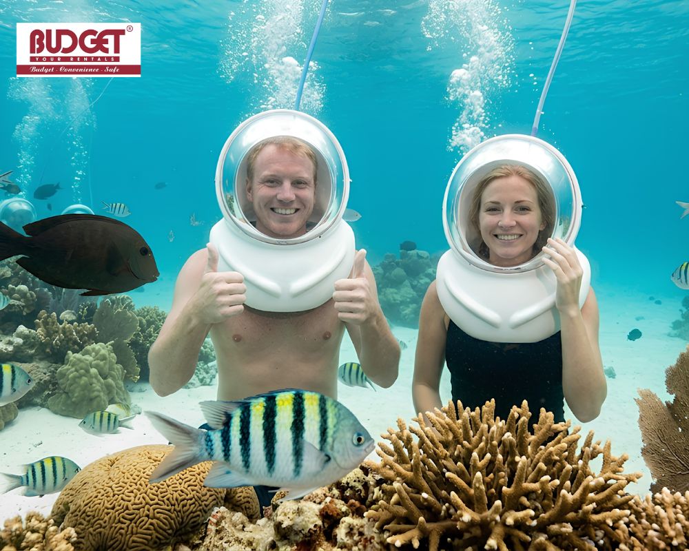 The-couple-enjoying-a-seawalking-experience-among-coral-reefs-and-colorful-tropical-fish