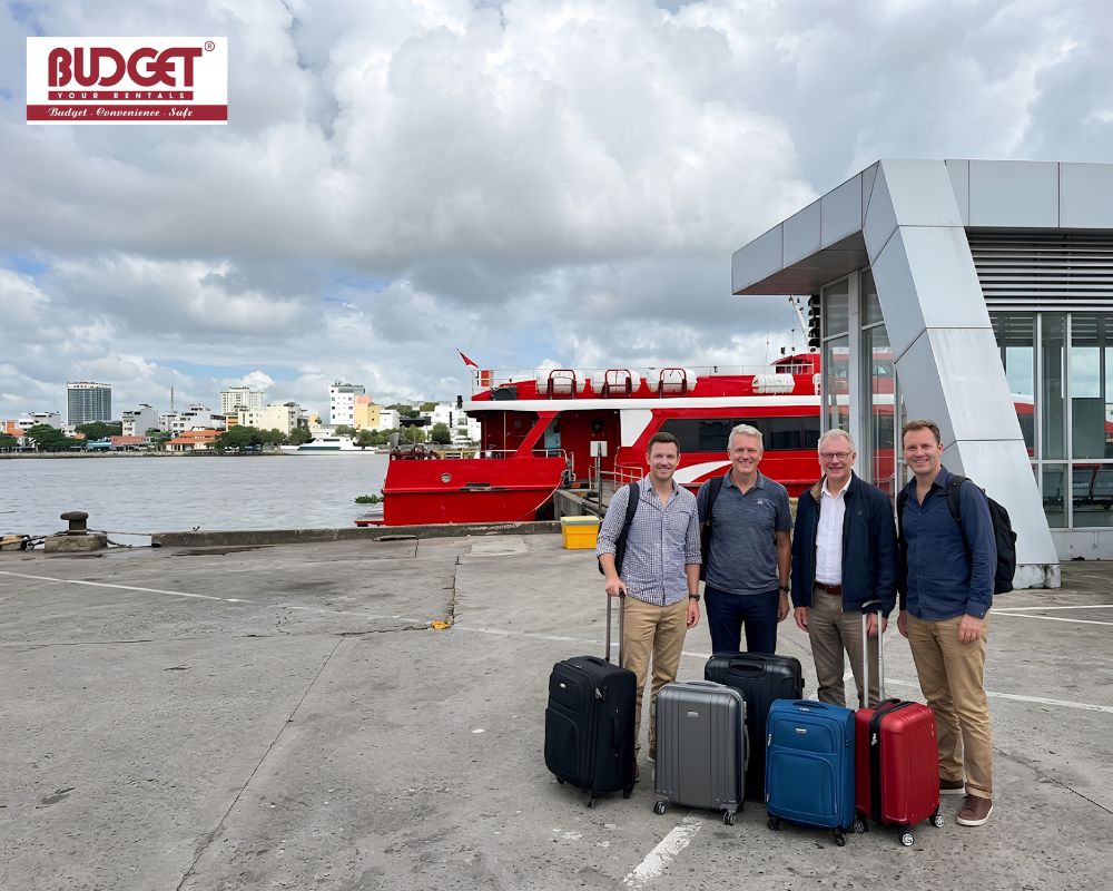 Group-of-international-travelers-took-a-picture-with-their-luggage-at-Ha-Tien-Pier-before-taking-the-ferry-to-Phu-Quoc