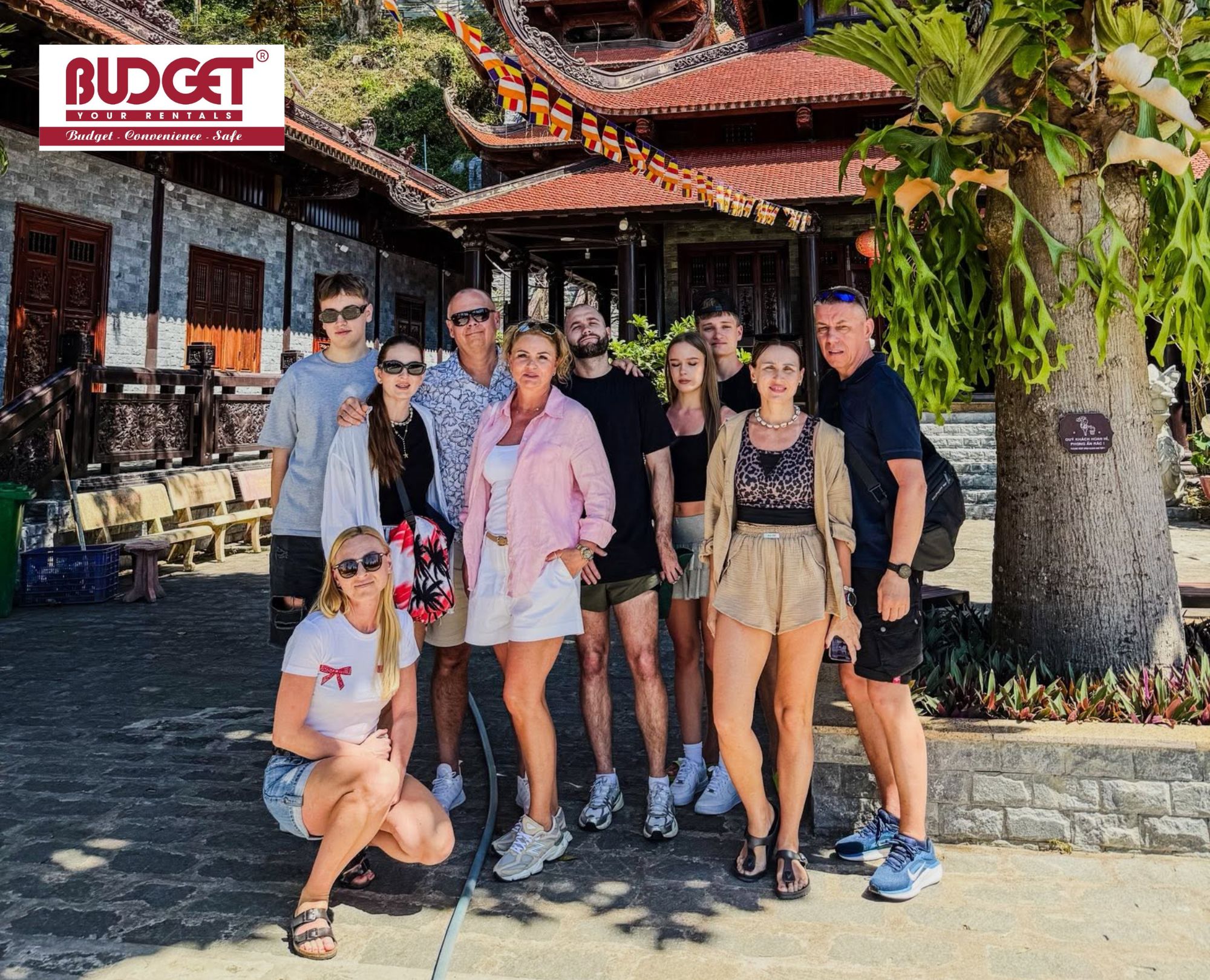 Happy-travelers-on-a-Mui-Ne-Private-Car-Transfers-To-Ho-Chi-Minh-Airport-trip-with-a-Ta-Cu-Mountain-stop