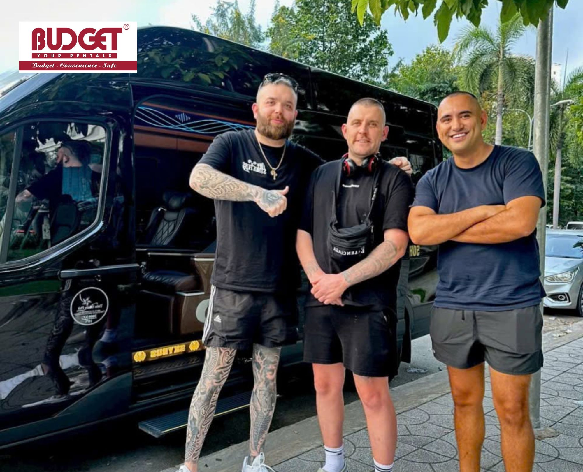 Three-men-standing-beside-a-luxury-black-limousine-van-in-Muine-before-reaching-to-Ho-Chi-Minh-city