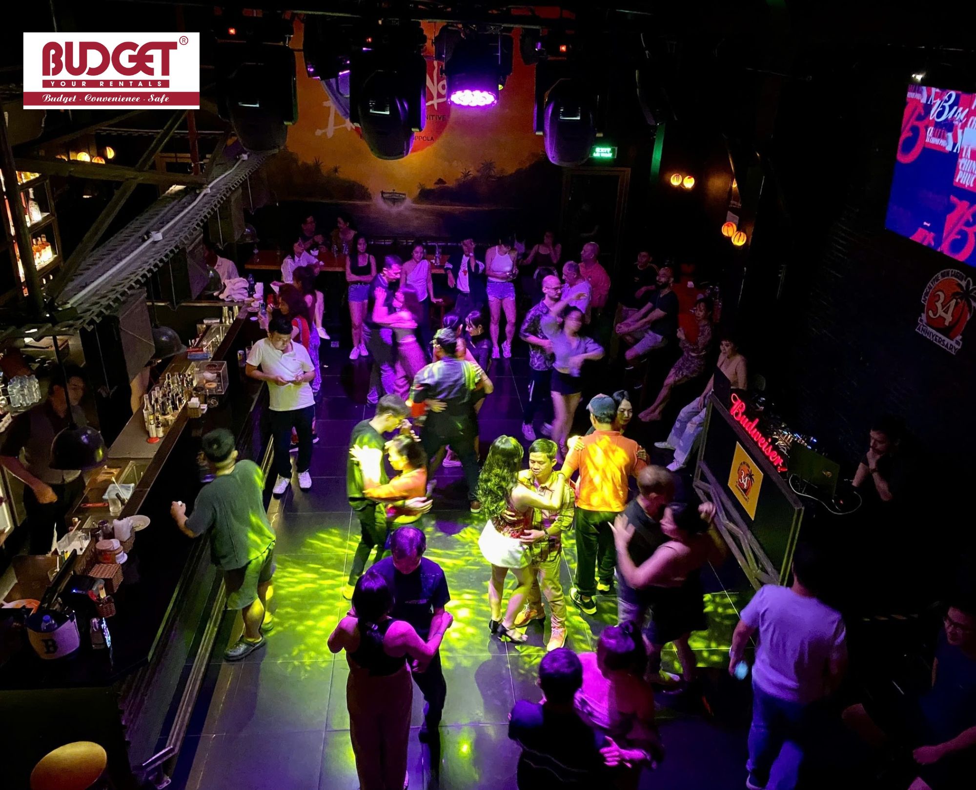 Apocalypse-Now-Saigon-nightclub-with-crowded-dance-floor-and-vibrant-lights