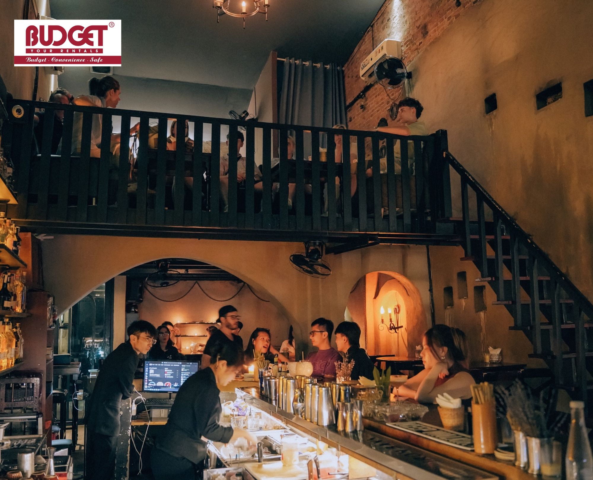 Inside-The-Iron-Bank-Saigon-featuring-mezzanine-seating-and-rustic-decor