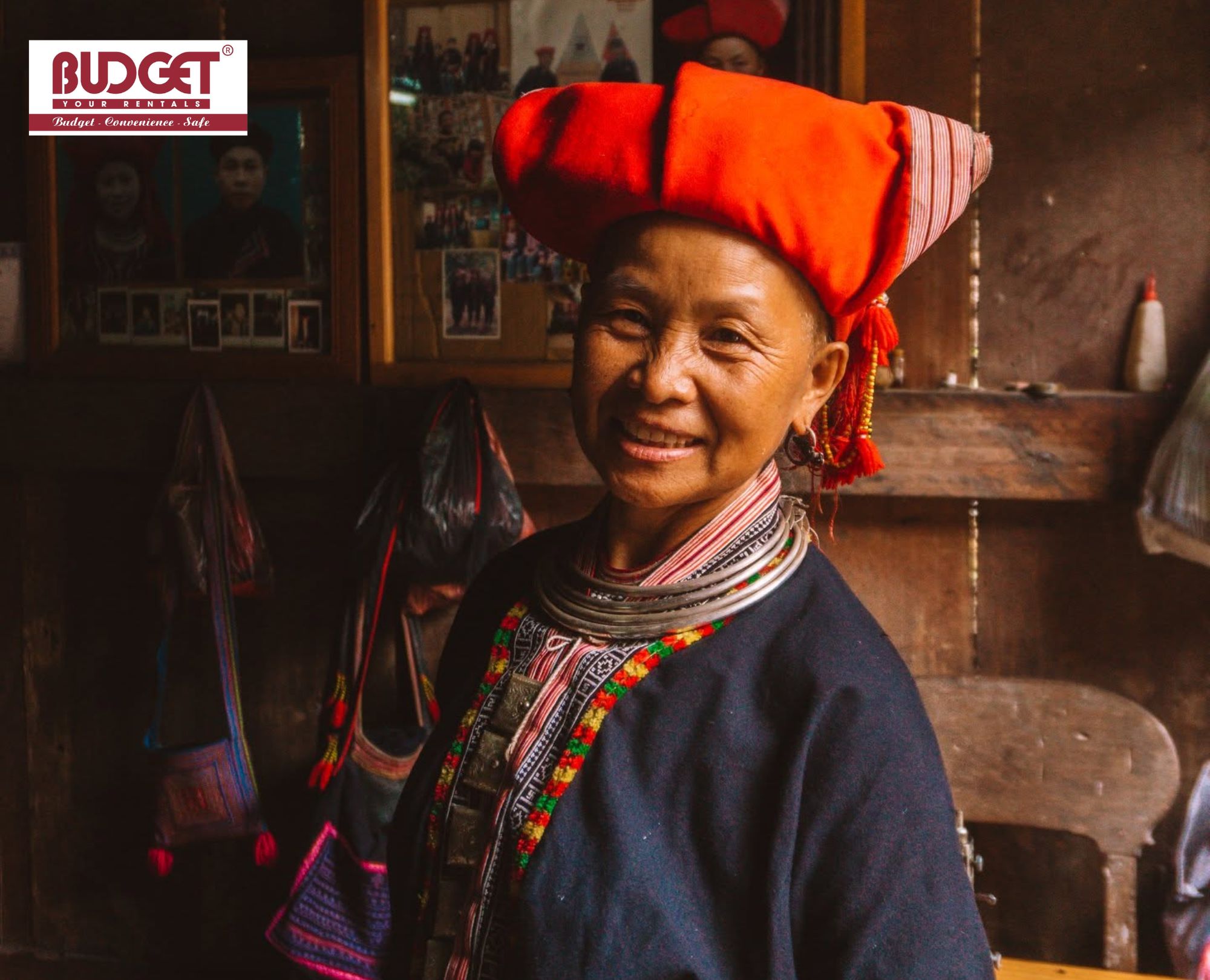Red-Dao-woman-who-wears-a-bright-red-headdress-smiles-warmly-during-cultural-experiences-in-the-villages
