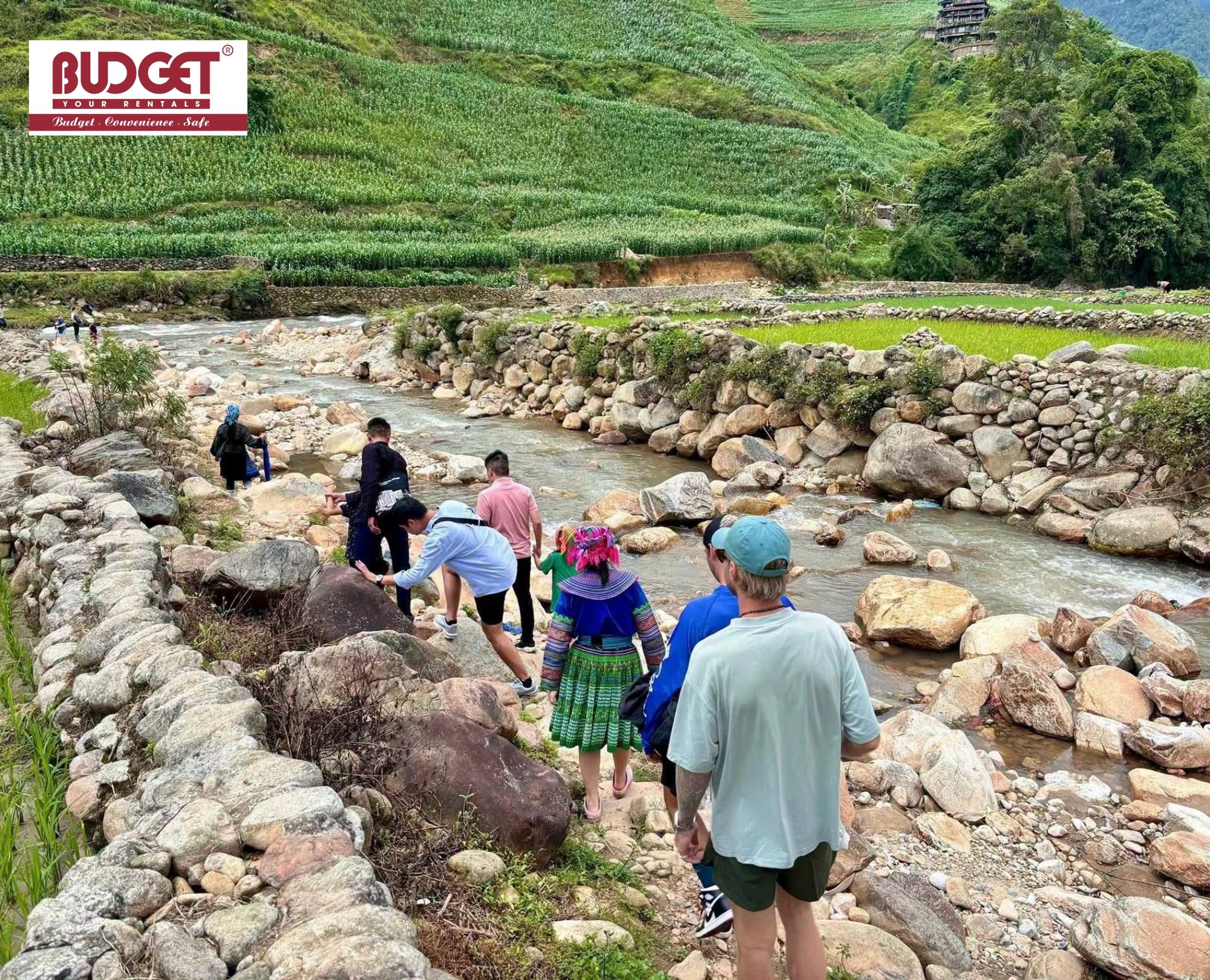 Trekking-group-beside-a-shallow-riverbed-in-the-valley-trek-which-starts-above-the-first-Hmong-village