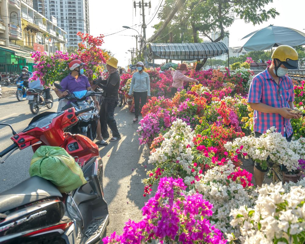 Locals buy flowers for decoration purpose the house