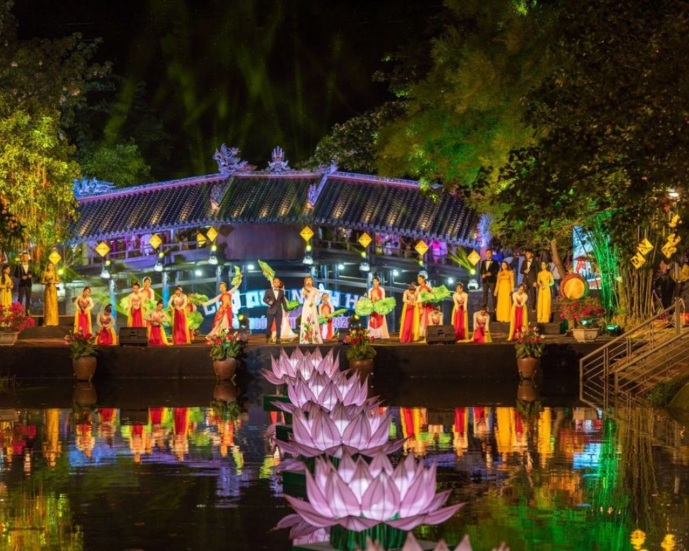 Performing at Thanh Toan Tile-roofed Bridge