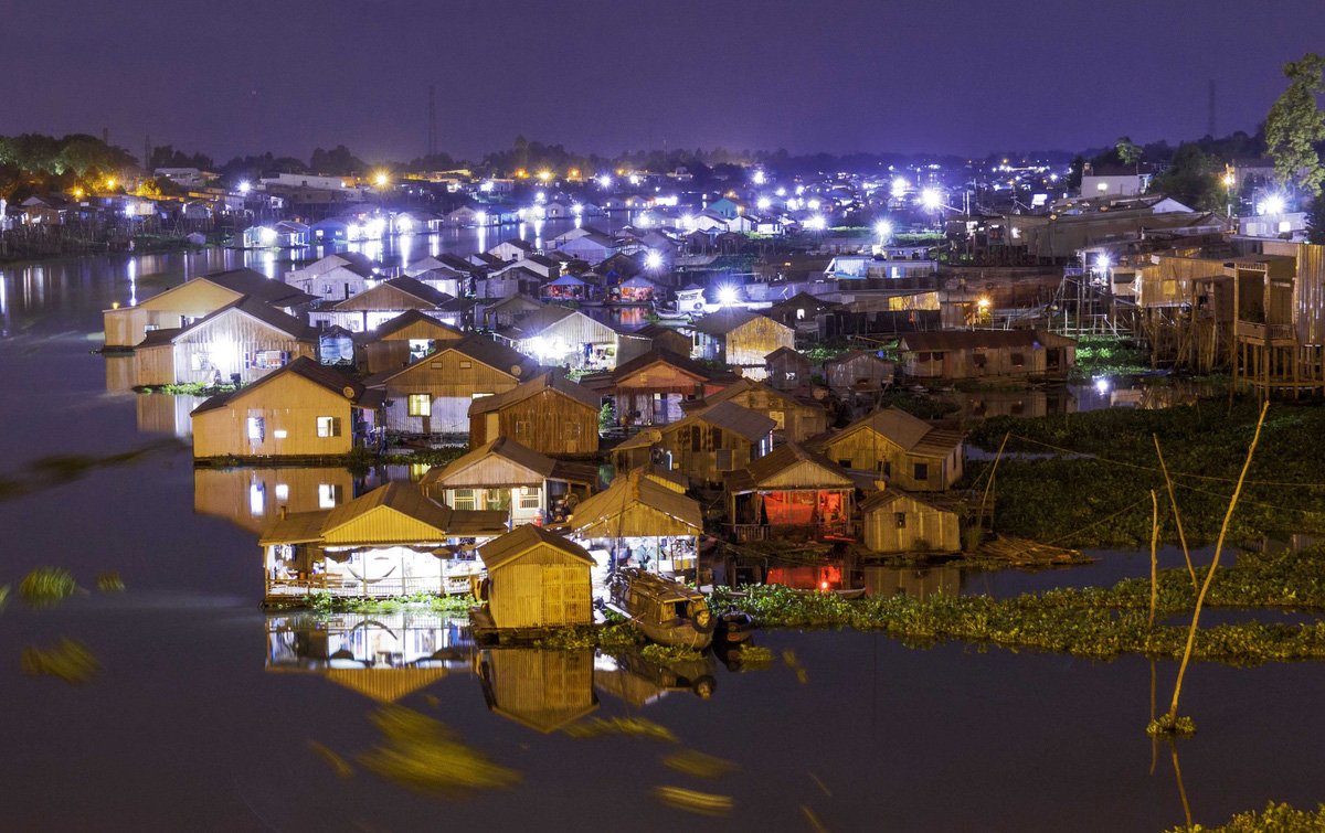 Admiring the Scenery of Chau Doc Floating Village at Night