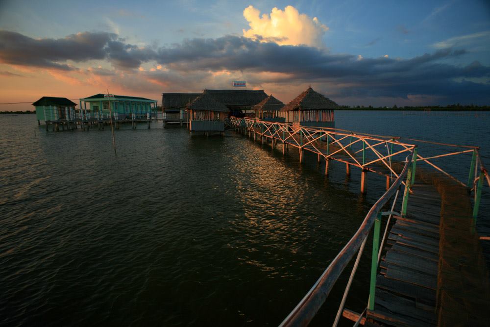 The sunset at Thi Tuong Lagoon in Ca Mau