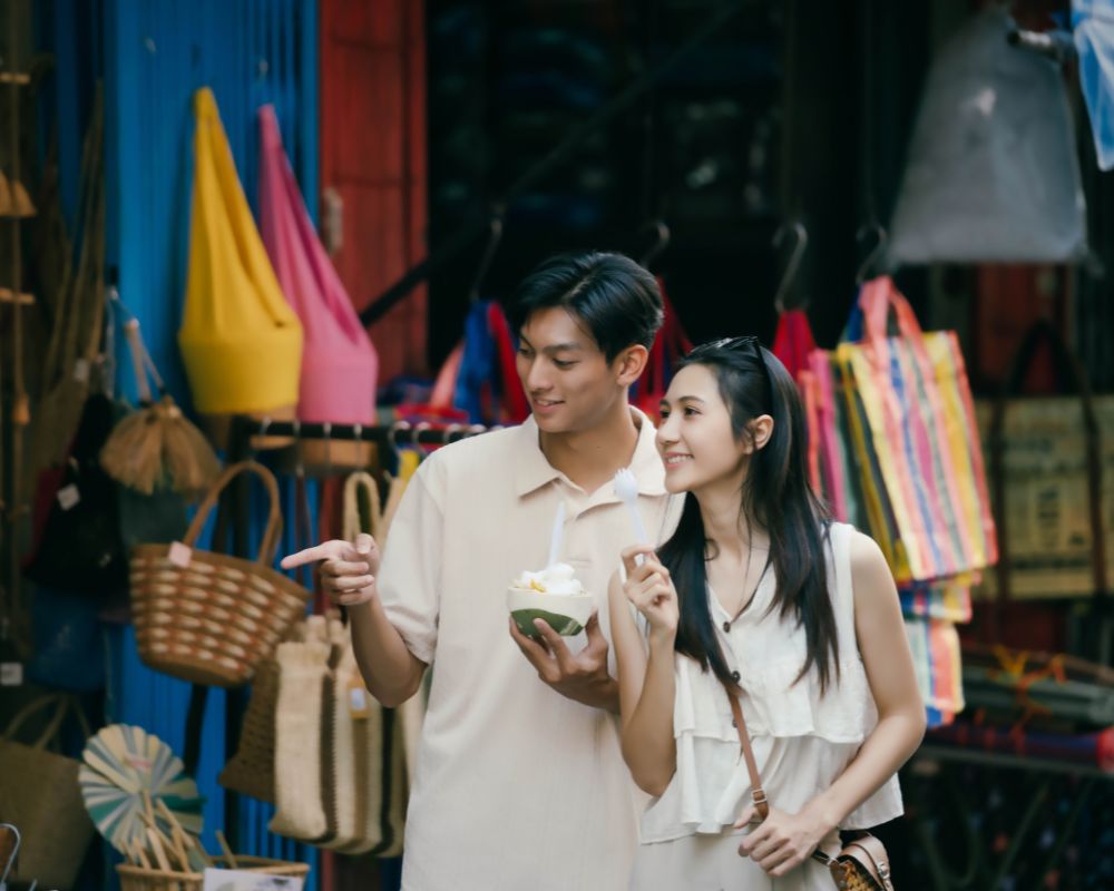 Couple walking through local market